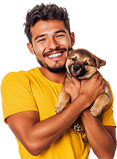 happy man holding a puppy