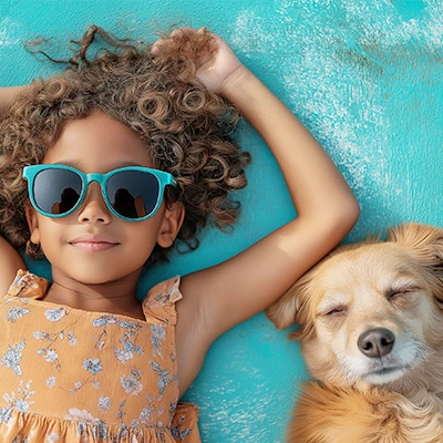 girl laying with dog